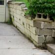 a collapsing retaining wall in Lees Summit