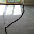 a huge crack in a concrete slab floor in Columbia