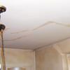 Drywall cracks in Overland Park that were poorly patched and repaired.