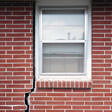 foundation cracks along a window in Lawrence