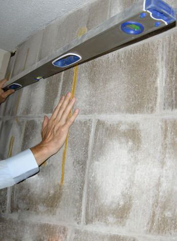 severe foundation wall failure symptoms of a basement wall in Raymore