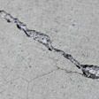 sinking outdoor concrete in need of mudjacking in Kansas City